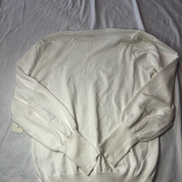 Elegant White Sweater with Button Accents - Picture 3 of 4